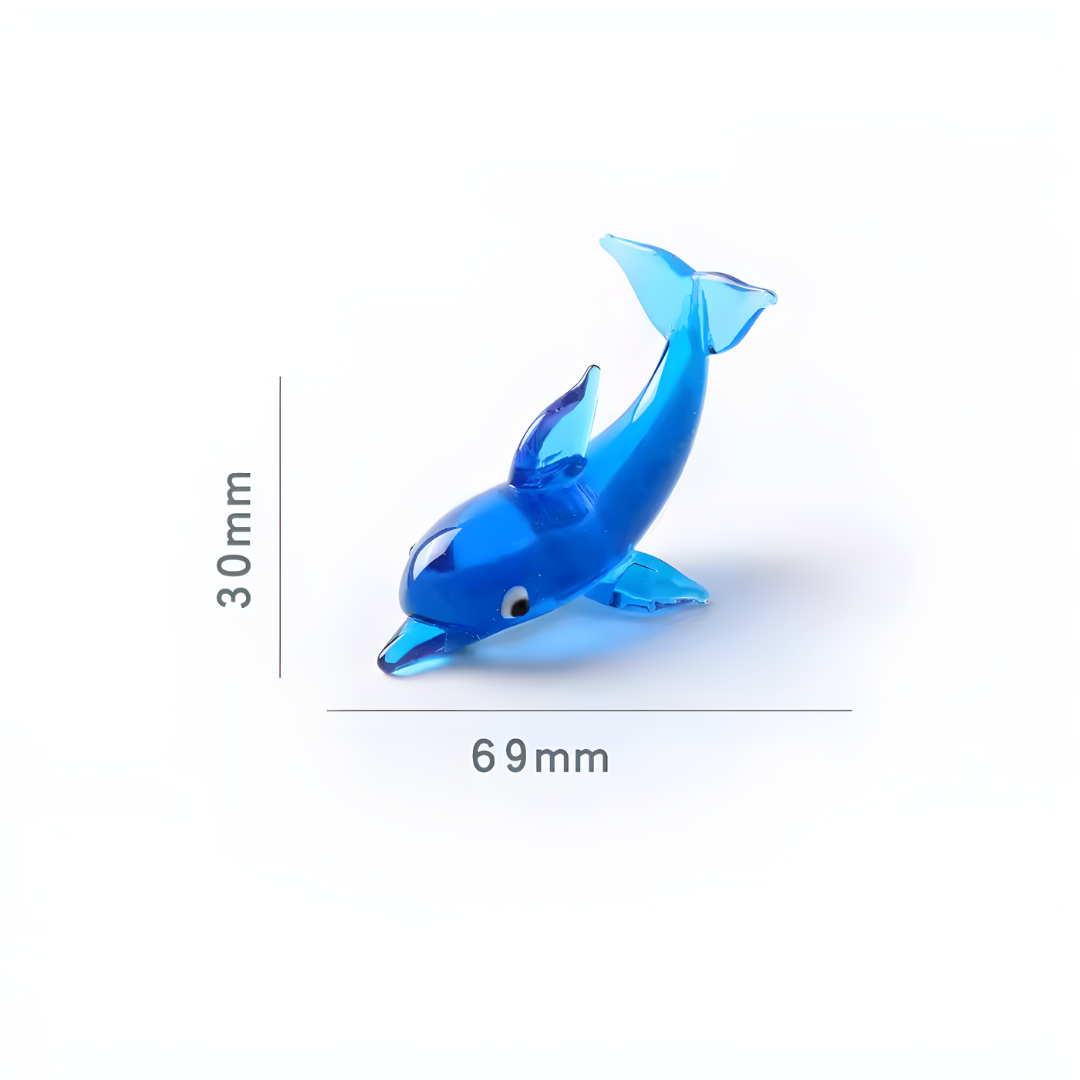 Figura de delfín de cristal con la cola elevada, 30x69 mm, estilo marino retro y detalles brillantes.